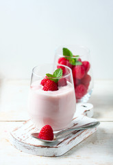 Yogurt smoothie with raspberries, fruit dessert, healthy dieting concept Natural detox.