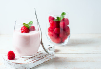 Yogurt smoothie with raspberries, fruit dessert, healthy dieting concept Natural detox.