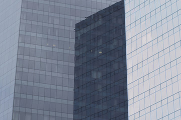 Obraz premium photo of high-rise buildings of glass and metal