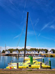 Yellow catamaran in the marina in Peenemünde. Germany