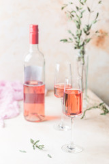 Two glasses and bottle of rose wine