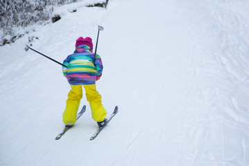 little girl skiing