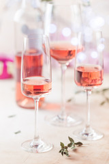 Glasses and bottle of rose wine