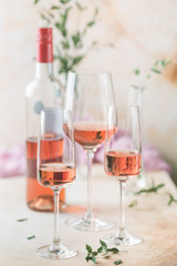 Glasses and bottle of rose wine