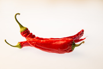 Red pepper on white isolated background. Pattern
