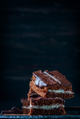 homemade chocolate brownies on dark background