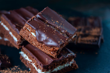 homemade chocolate brownies on dark background