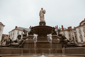Royal square with fountain in Nantes city in France.