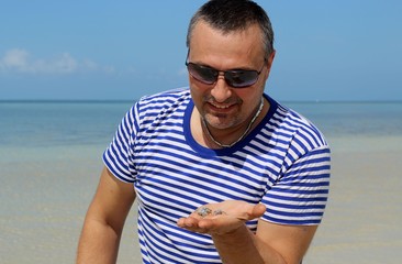 young man on the beach