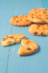 chip cookies with nuts/chip cookies with nuts on a blue wooden background, close up