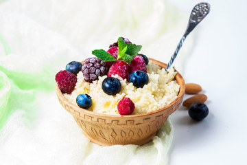 Healthy couscous salad with berries.