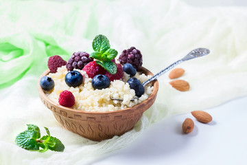 Healthy couscous salad with berries.