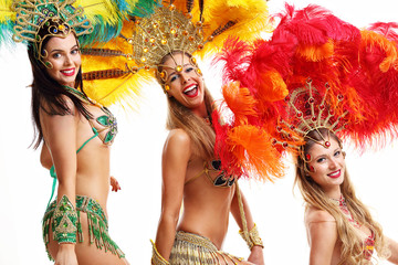 Brazilian women dancing samba over white background