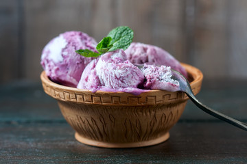 Homemade ice cream blueberries and mint.