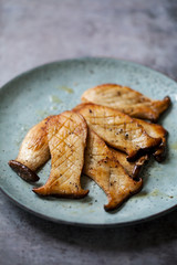 King oyster mushrooms sautee in butter with salt and pepper