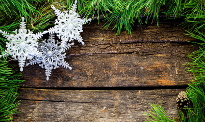 Vintage  Christmas holiday wooden planks rural background. Beautiful Empty Christmas Backdrop decorated with snow.  New Year Background.  Xmas background with pine branches