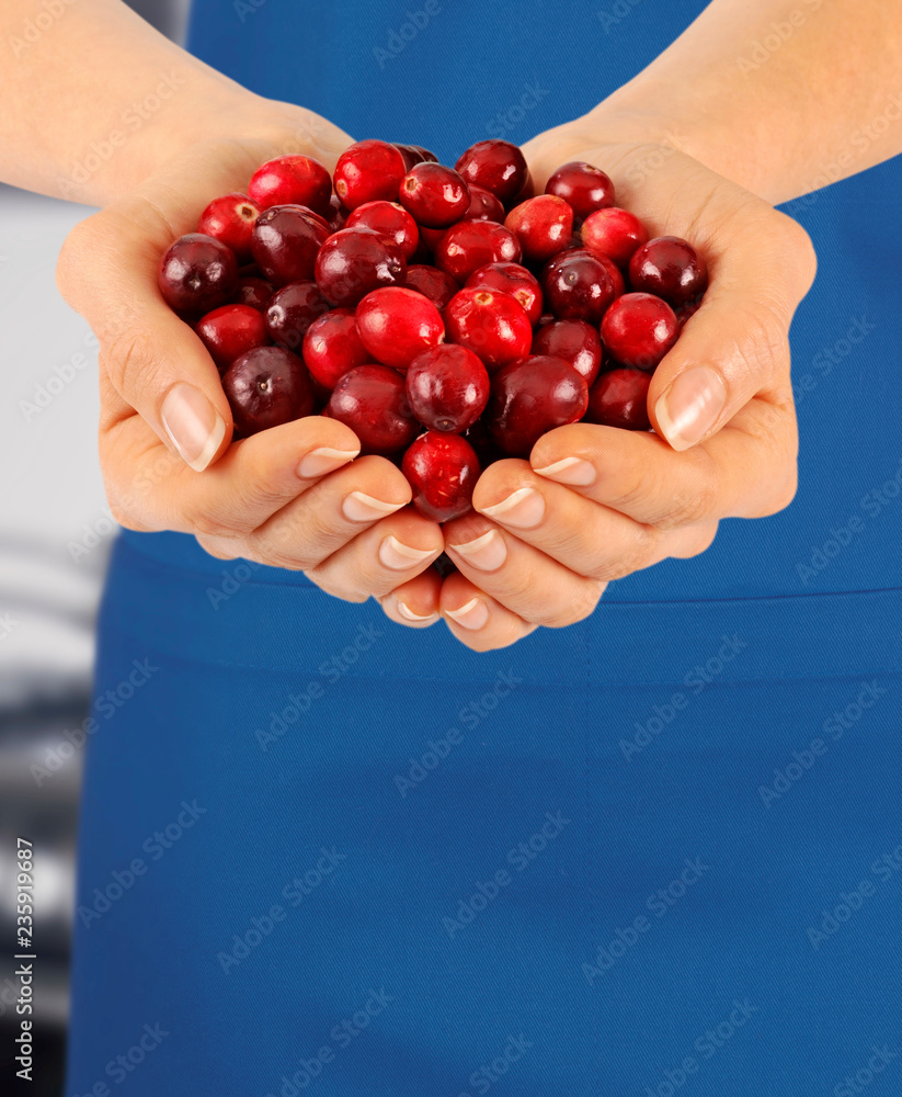 Canvas Prints woman with handful of fresh cranberries