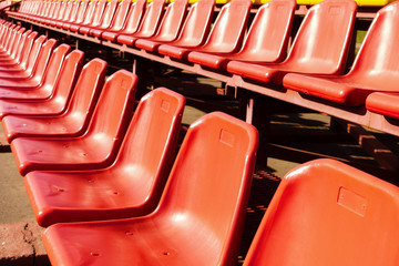 empty plastic seats at the sports stadium. tribunes.