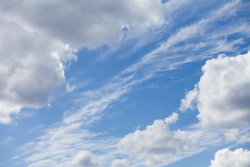 White fluffy clouds in the blue sky