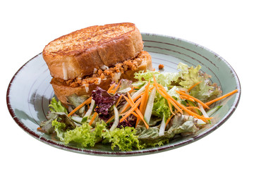 Breakfast. Toast with rabbit, cheese and herbs