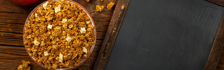 Apple Cinnamon Granola Back to school. Education background concept with copyspace. Selective focus.