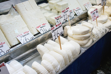 Turkish farmer market. Assortment of fresh traditional white organic cheese with price on the counter