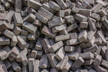 A large pile of disassembled paving stones.