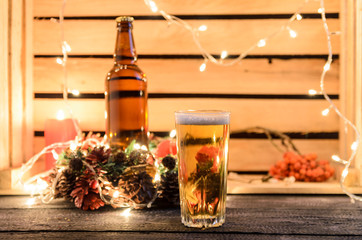 Christmas composition with a glass of beer