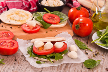 Tigella bread with spinach and tomatoes. 