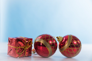 Christmas ball and decoration on a wooden board