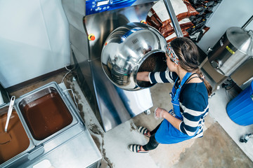 Woman working at a chocolate factory