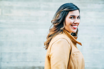 Side profile of smiling woman