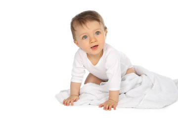 Baby krabbelt über eine Decke © Joerch