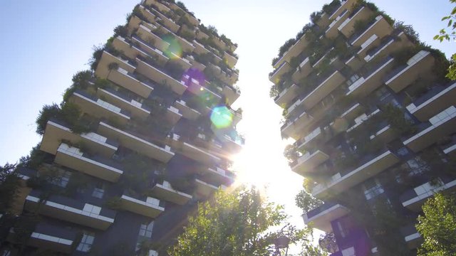 Milan, Italy - September 26, 2018: Modern and ecologic skyscrapers with many trees on every balcony