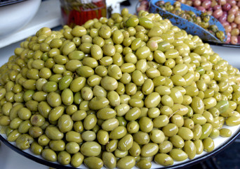 GREEN OLIVES ON MARKET STALL