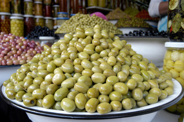 GREEN OLIVES ON MARKET STALL