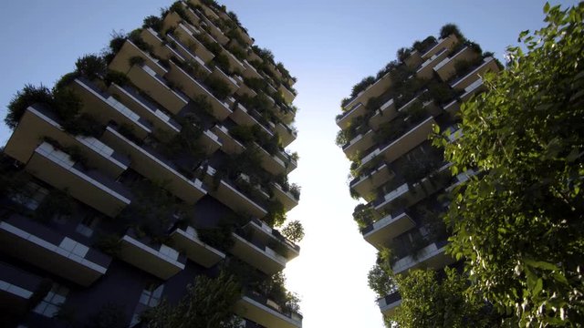 Milan, Italy - September 26, 2018: Modern and ecologic skyscrapers with many trees on every balcony