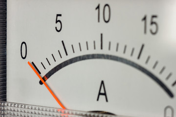 The white scale of the ammeter with zero position of the indicator