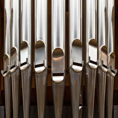 Close-up of modern steel organ pipe