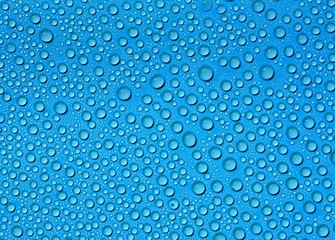 closeup drops water on blue background
