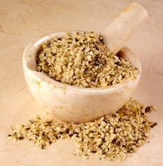 HEMP SEEDS IN PESTLE AND MORTAR
