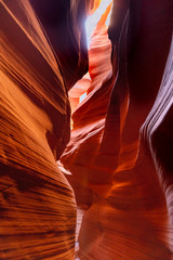 Sun light above orange red canyon of upper antelope, Arizona,