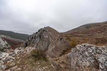 Photo with spectacular views of the mountain in the area of ciñera de gordon in Leon (Spain), with the typical colors of autumn, ocher, red, yellow brown...