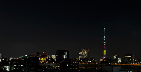 Fototapeta na wymiar Tokyo skytree tower in Janpan in night light with brigde and building
