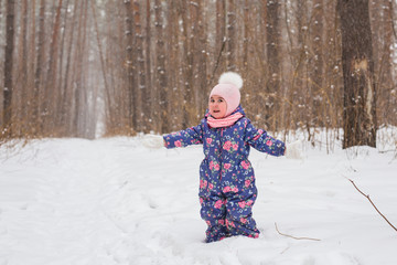 Family and nature concept - Beautiful little girl playng in the park