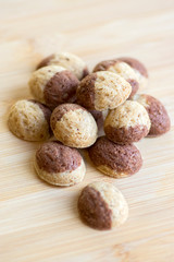 Cinnamon sandbakelse christmas cookies, two color, cocoa dark brown and vanilla light golden brown, delicious czech cookies