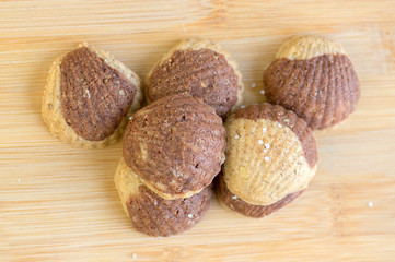 Cinnamon sandbakelse christmas cookies, two color, cocoa dark brown and vanilla light golden brown, delicious czech cookies
