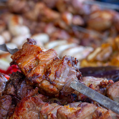 Street food, grilled meat on a spit. Homemade.