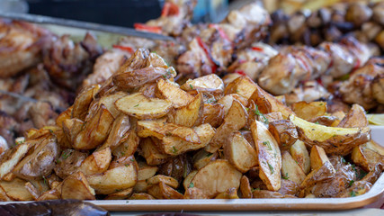 Golden roasted potatoes cooked on a grill