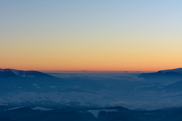 Sunset in the mountains in winter